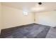 Spacious unfinished basement featuring vinyl flooring, white walls, and a window for natural light at 101 2Nd St, Fort Lupton, CO 80621