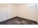 Finished basement room with neutral carpeting, a window, and a light fixture at 101 2Nd St, Fort Lupton, CO 80621