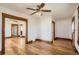 Spacious living room with hardwood floors, open layout, and classic trim throughout at 101 2Nd St, Fort Lupton, CO 80621