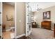 Home office featuring a desk, chair, and natural lighting at 7408 Xenophon St, Arvada, CO 80005