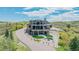 Beautiful home with stone exterior and outdoor living space, sitting atop a hill with a fire pit at 3520 Castle Butte Dr, Castle Rock, CO 80109