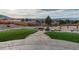 An outdoor living space featuring a fire pit, manicured lawn, and expansive views at 3520 Castle Butte Dr, Castle Rock, CO 80109