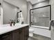 Modern bathroom featuring a dark wood vanity, quartz countertop, and sleek glass-enclosed shower at 3520 Castle Butte Dr, Castle Rock, CO 80109