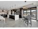 Open-concept kitchen with eat-in space, stainless steel appliances, and a large center island with seating at 3520 Castle Butte Dr, Castle Rock, CO 80109