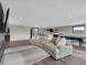 Spacious living room features recessed lights, wood floors, and a modern sectional sofa at 3520 Castle Butte Dr, Castle Rock, CO 80109