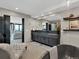 Luxurious bathroom with a freestanding tub, large vanity, and access to the living room with an amazing view at 3520 Castle Butte Dr, Castle Rock, CO 80109