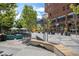 Inviting outdoor area with modern bench seating and views of the surrounding city landscape at 1625 Larimer St # 2601, Denver, CO 80202
