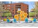 Art installation at a public space featuring colorful sculptures and seating areas for relaxation at 1625 Larimer St # 2601, Denver, CO 80202