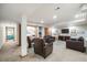 Finished basement features a dark wood TV console and a work area with an ornate pencil for decor at 2777 S Elmira St # 17, Denver, CO 80231