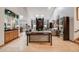 Spacious living room with light hardwood floors, fireplace, and large windows at 2777 S Elmira St # 17, Denver, CO 80231