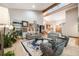 Inviting living room with high ceilings, skylights, comfortable seating, and a stylish rug at 2777 S Elmira St # 17, Denver, CO 80231