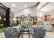 Bright living room featuring large windows, high ceilings, fireplace, and stylish furniture at 2777 S Elmira St # 17, Denver, CO 80231