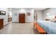 Spacious main bedroom featuring hardwood floors, furnishings, and walk-in closet at 2777 S Elmira St # 17, Denver, CO 80231