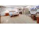 Large main bedroom showcasing hardwood floors, natural light, and decorative wall art at 2777 S Elmira St # 17, Denver, CO 80231