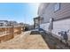 Small backyard with a wooden fence and exterior utilities at 21795 E 8Th Ave, Aurora, CO 80018