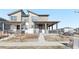 Two story home with a front porch and walkway at 21795 E 8Th Ave, Aurora, CO 80018