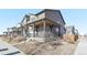 Two-story house with a front porch and landscaping at 21795 E 8Th Ave, Aurora, CO 80018