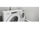 Convenient laundry room with Whirlpool washer and dryer at 21795 E 8Th Ave, Aurora, CO 80018