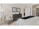 Serene bedroom with soft lighting, a cozy chair, and stylish decor at 10176 Park Meadows Dr # 2408, Lone Tree, CO 80124