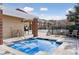 A relaxing community hot tub with seating offers a great space to unwind, with a covered patio nearby at 10176 Park Meadows Dr # 2408, Lone Tree, CO 80124