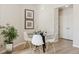 Inviting dining area with modern decor, a glass table, and contemporary chairs at 10176 Park Meadows Dr # 2408, Lone Tree, CO 80124