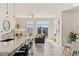 Bright living space with fireplace, large windows, and stylish furnishings at 10176 Park Meadows Dr # 2408, Lone Tree, CO 80124