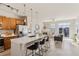 Bright, open-concept space with modern kitchen island, fireplace and comfortable living area at 10176 Park Meadows Dr # 2408, Lone Tree, CO 80124