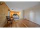 Spacious bedroom with wood walls, hardwood floors, and ample closet space at 638 Kinnikinnik Hl, Golden, CO 80401
