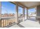 Covered porch with view of the neighborhood and playground at 12224 Olive Way, Thornton, CO 80602