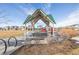 Community playground with covered seating at 12224 Olive Way, Thornton, CO 80602