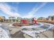 Community playground with playset and slide at 12224 Olive Way, Thornton, CO 80602