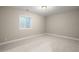 Neutral bedroom with a window offering natural light, creating a calming and inviting atmosphere at 9587 Kentwick Cir, Englewood, CO 80112