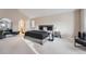 Serene bedroom with vaulted ceiling, neutral tones, and modern furnishings at 5470 S Jasper Way, Centennial, CO 80015