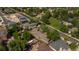 The aerial view highlights the property's location near a park, green spaces, and other residences at 2175 S Joliet St, Aurora, CO 80014