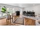 Dining room with bright natural light, hard wood floors and modern design at 2175 S Joliet St, Aurora, CO 80014