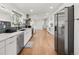 Bright and airy kitchen with stainless steel appliances, modern design, and lots of counter space at 2175 S Joliet St, Aurora, CO 80014
