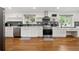 Bright kitchen featuring modern stainless steel appliances, and stylish countertops at 2175 S Joliet St, Aurora, CO 80014