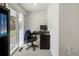 Bright office space with sliding glass doors and modern furnishings at 2175 S Joliet St, Aurora, CO 80014