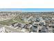 Sprawling aerial view of the neighborhood showcasing the community's design and scenic location at 2243 Villageview Ln, Castle Rock, CO 80104