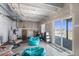 Unfinished basement with sliding glass door access to the backyard, awaiting customization at 2243 Villageview Ln, Castle Rock, CO 80104