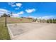 Community basketball court featuring well-maintained pavement, hoops, and lush surroundings at 2243 Villageview Ln, Castle Rock, CO 80104