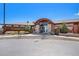 Community clubhouse exterior featuring attractive architecture and welcoming entryway and landscaping at 2243 Villageview Ln, Castle Rock, CO 80104