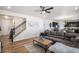 Comfortable living room and kitchen area showcasing modern decor and plenty of seating at 2243 Villageview Ln, Castle Rock, CO 80104