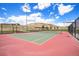 Active living with access to a community tennis court with view of blue skies and rolling hills at 2243 Villageview Ln, Castle Rock, CO 80104