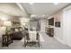 Basement living room with neutral tones and comfortable seating at 1901 S Lincoln St, Denver, CO 80210