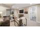 Cozy basement living room with modern furnishings and a view to a bathroom at 1901 S Lincoln St, Denver, CO 80210
