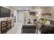 Finished basement living room featuring modern decor and a sliding barn door at 1901 S Lincoln St, Denver, CO 80210