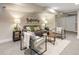 Cozy finished basement with comfortable seating, neutral tones, and stylish decor at 1901 S Lincoln St, Denver, CO 80210