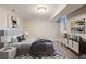 Bright bedroom with a modern rug, a large window, and contemporary decor at 1901 S Lincoln St, Denver, CO 80210