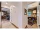 Hallway leading to a comfortable seating area and a bright office space at 2844 Bellaire St, Denver, CO 80207
